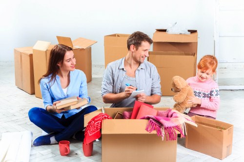 Removal van outside a terraced house in Egham