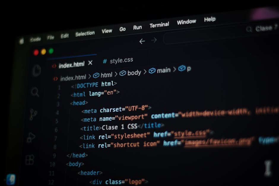 A computer screen displaying HTML code with syntax highlighting. The code includes tags such as <html>, <head>, <title>, and <link>, and shows a stylesheet reference. The screen is part of a workspace