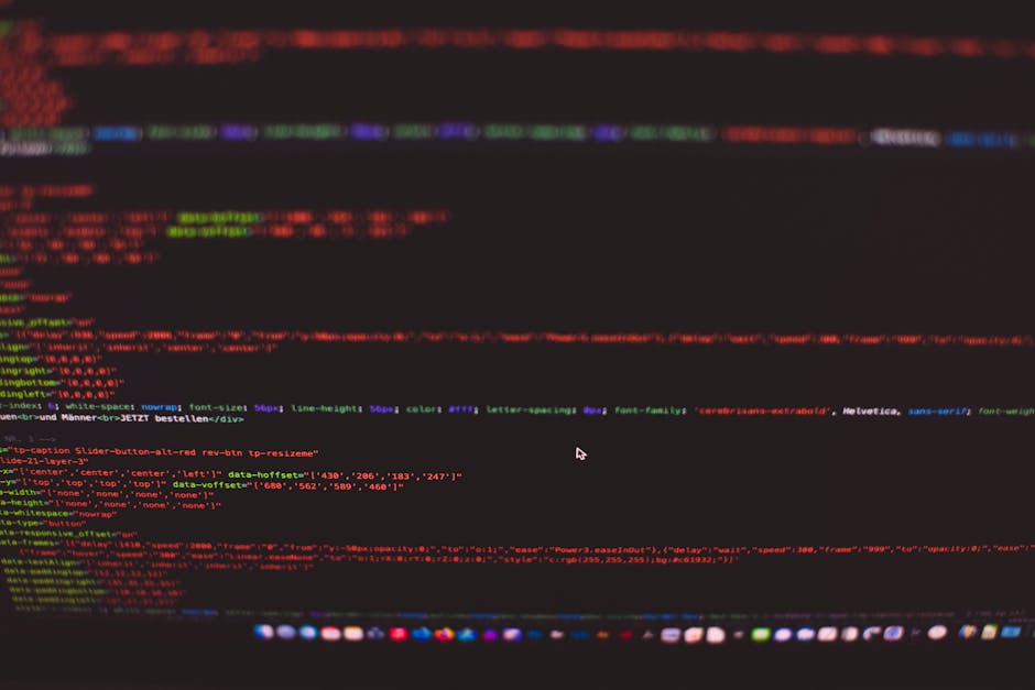 A computer screen displaying HTML code with syntax highlighting. The code includes tags such as <html>, <head>, <title>, and <link>, and shows a stylesheet reference. The screen is part of a workspace